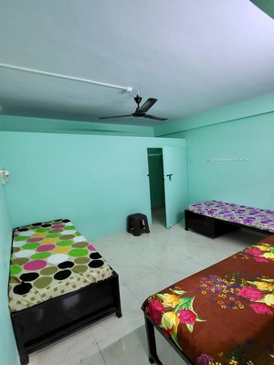 Room interior showcasing natural light and study tables